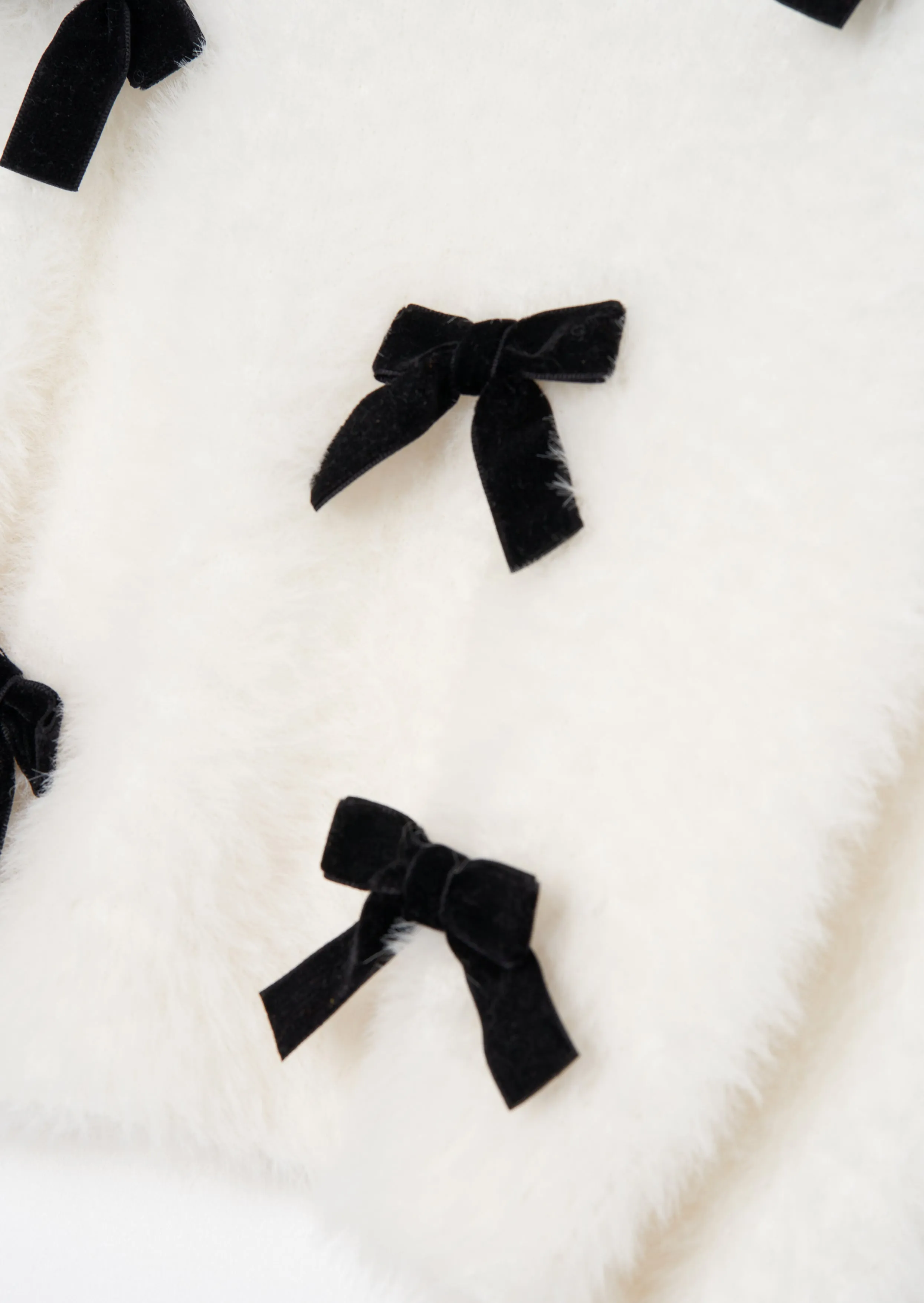 Mia Ivory Bow Eyelash Jumper
